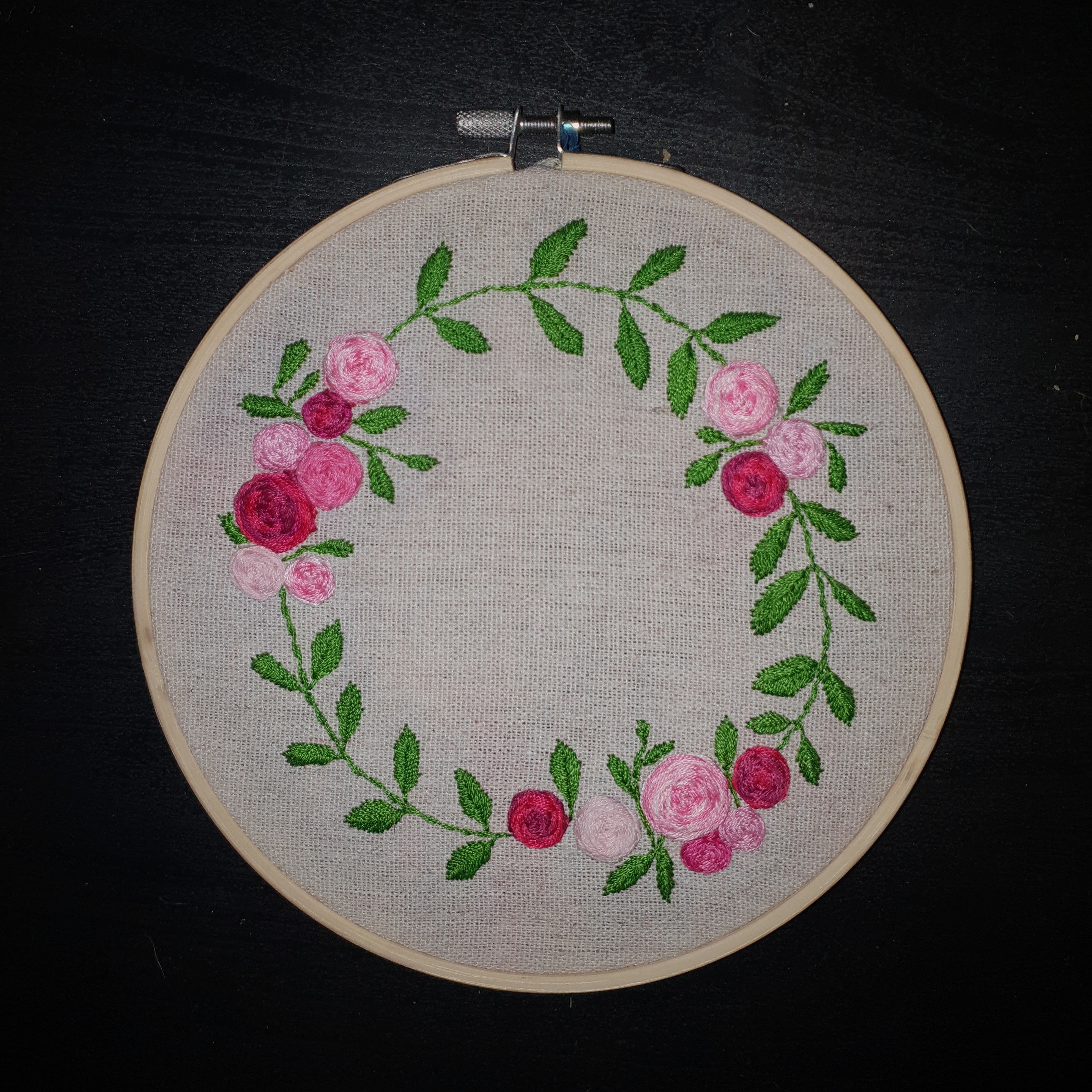 Embroidery of rose wreath