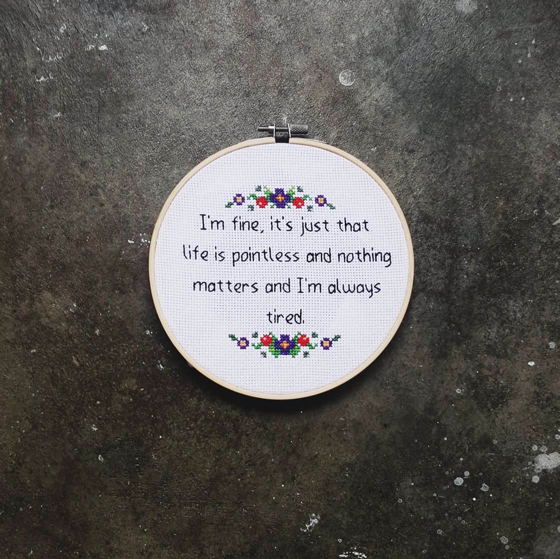 Cross-stitched piece with funny text from Parks & Rec