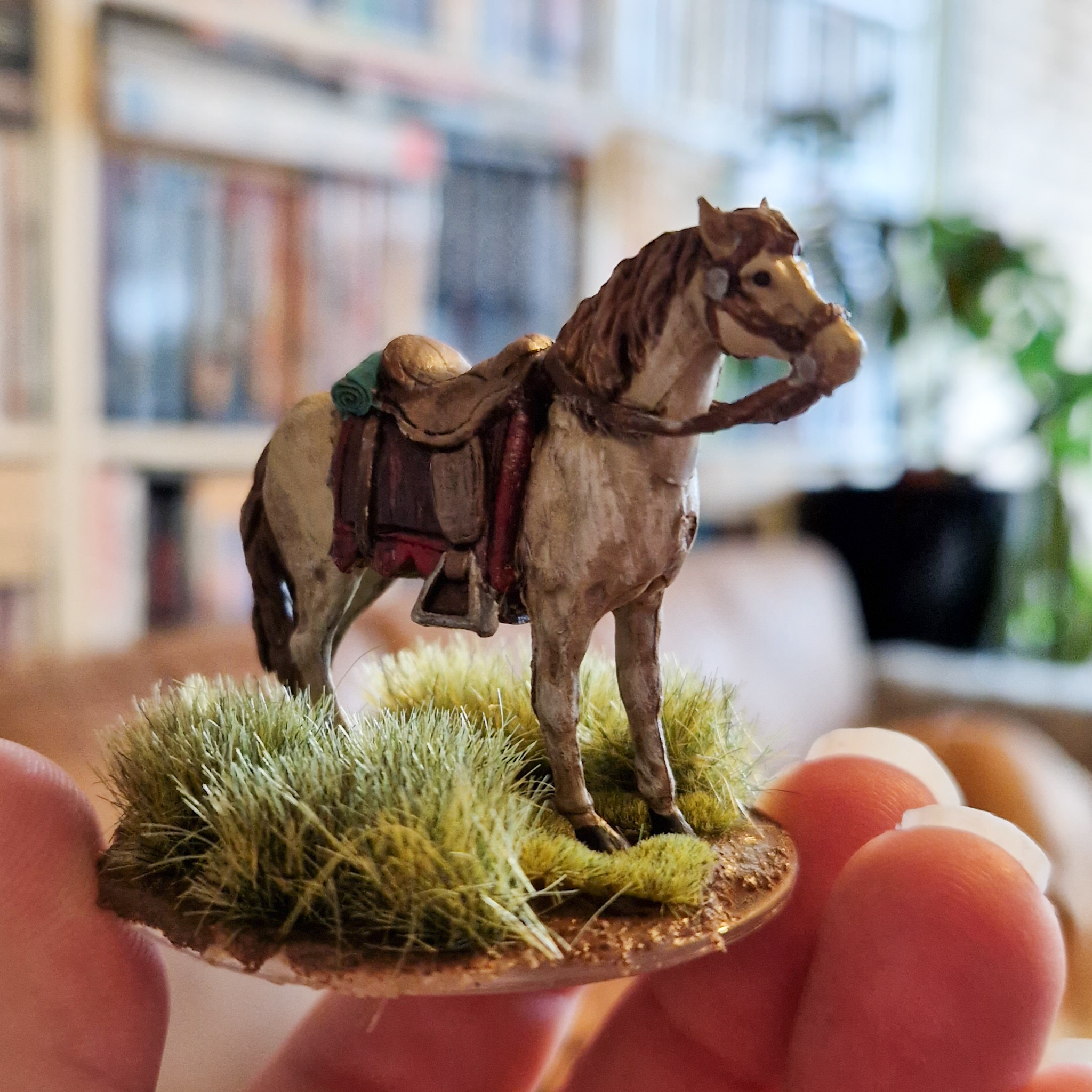 A painted miniature horse, suitable for tabletop rpgs such as Dungeons & Dragons.